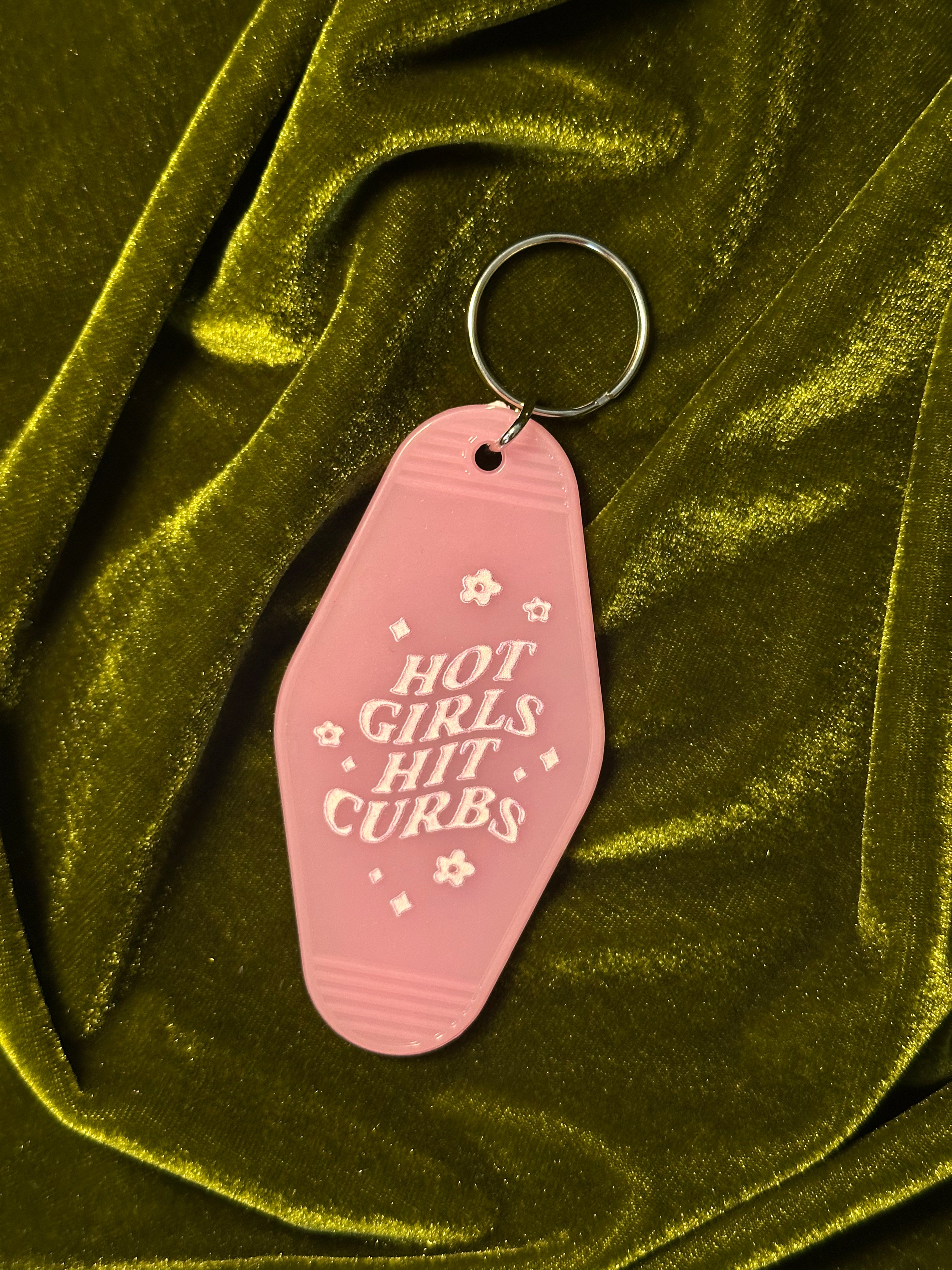 Hot girls hit curbs keychain